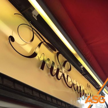 Black script cut out lettering signage - installed by Acres Signs and Graphics