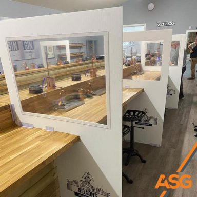 Branded Covid desk dividers for Nelsons Gin's office printed by Acres Signs and Graphics