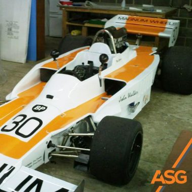 Racing car wrapped by Acres Signs and Graphics