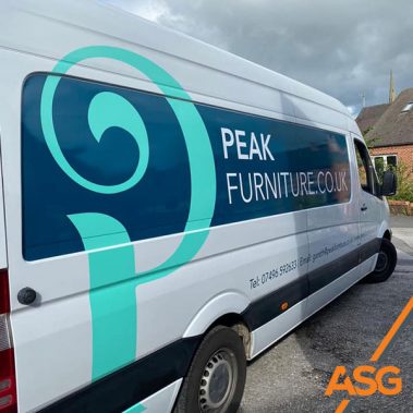 Partial wrap on white van for Peak Furniture - wrapped by Acres Signs and Graphics