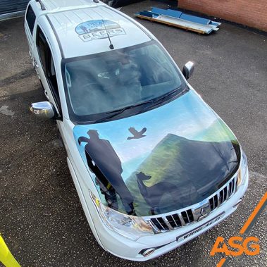 White Mitsubishi with bonnet and roof livery for Peak District Beers - wrapped by Acres Signs and Graphics