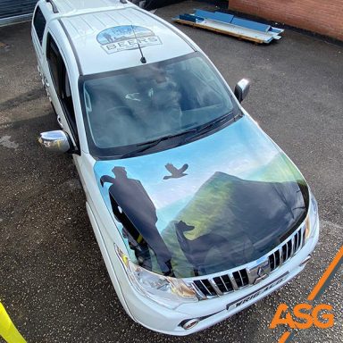 White Mitsubishi with bonnet and roof livery for Peak District Beers - wrapped by Acres Signs and Graphics