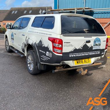 White Mitsubishi with partial livery wrap for Peak District Beers - wrapped by Acres Signs and Graphics